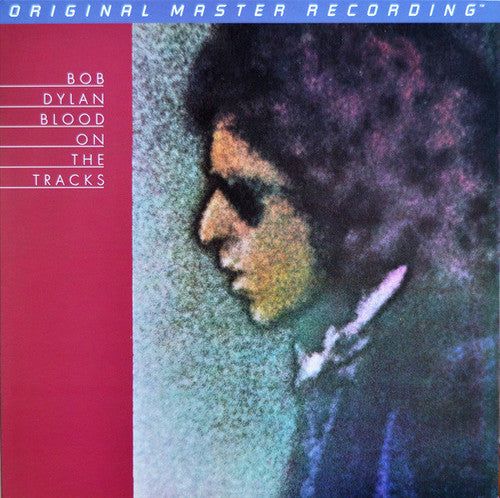 the album cover for Bob Dylan - Blood On The Tracks [Limited Edition] [180 Gram]