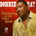 the album cover for Donnie Ray - Drowning in My Own Tears