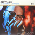 the album cover for J Wilkes D & The Dirt Daubers - Wild Moon