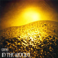 the album cover for In The Woods - Omnio [Limited Edition] [Colored Vinyl] [180 Gram]