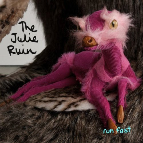 the album cover for The Julie Ruin - Run Fast