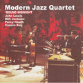 the album cover for The Modern Jazz Quartet - Round Midnight