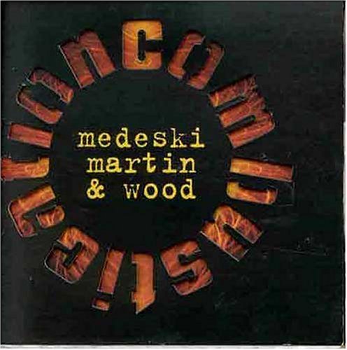 the album cover for Medeski, Martin & Wood - Combustication [Import]