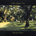 the album cover for Eddie Higgins - Haunted Heart