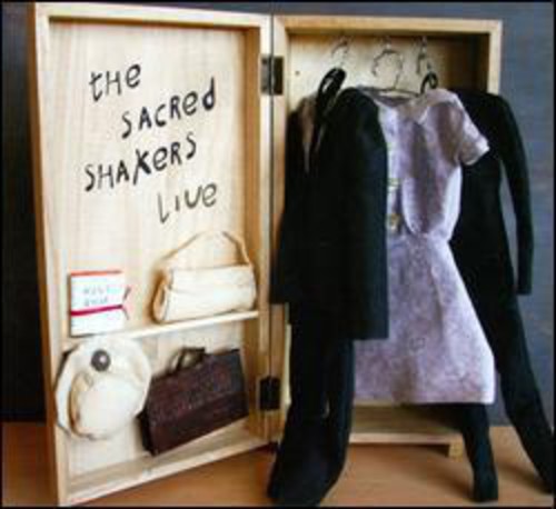 the album cover for The Sacred Shakers - Live