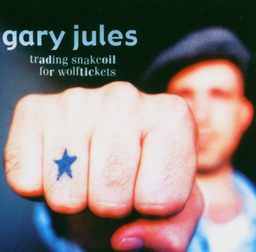 the album cover for Gary Jules - Trading Snakeoil For Wolftickets
