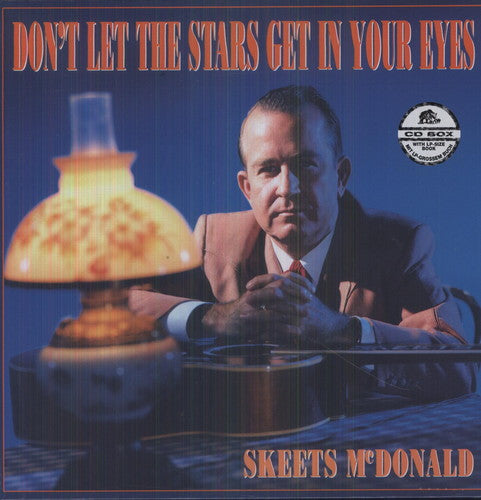the album cover for Skeets Mcdonald - Don't Let The Stars Get In Your Eyes [Import]