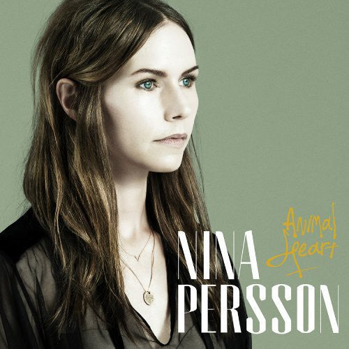 the album cover for Nina Persson - Animal Heart