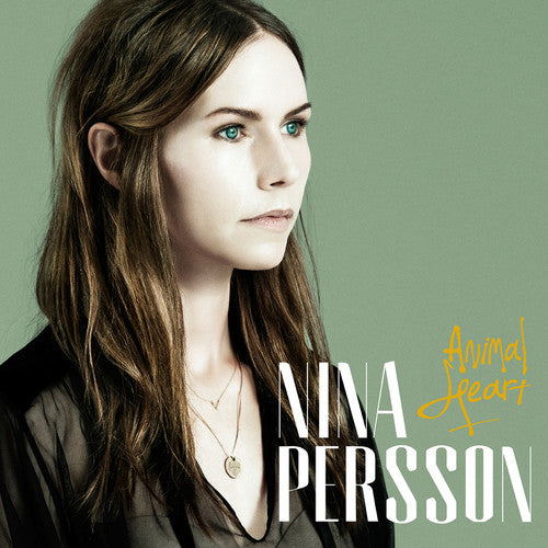the album cover for Nina Persson - Animal Heart