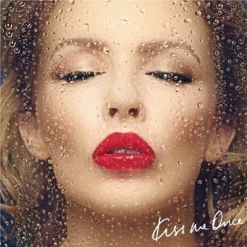the album cover for Kylie Minogue - Kiss Me Once