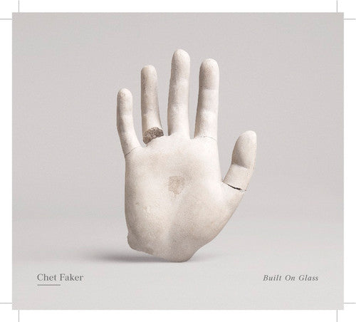 the album cover for Chet Faker - Built on Glass