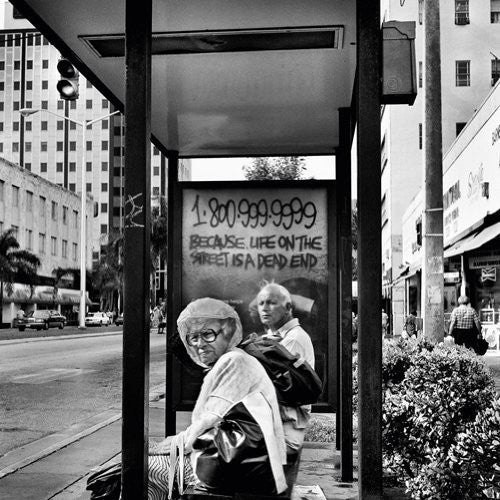 the album cover for Millie & Andrea - Drop the Vowels