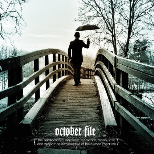the album cover for October File - Application of Lonleiness Ignorance Misery