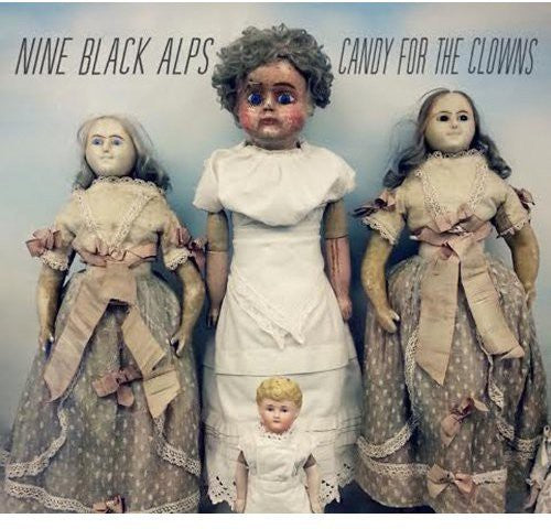the album cover for Nine Black Alps - Candy for the Clowns