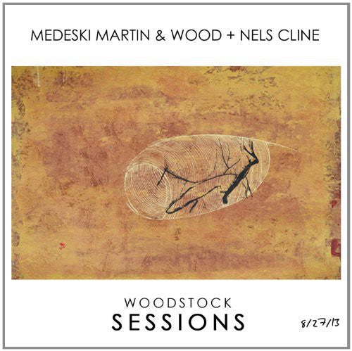 the album cover for Medeski Martin & Wood + Nils Cline - Woodstock Sessions 2