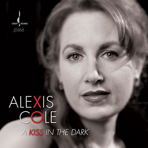 the album cover for Alexis Cole - Kiss in the Dark
