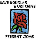 the album cover for Dave Douglass / Caine,Uri - Present Joys