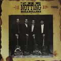 the album cover for Notting Hillbillies - Missing... Presumed Having a Good Time [Vinyl]