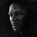 the album cover for Common - Nobody's Smiling