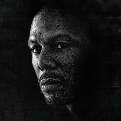 the album cover for Common - Nobody's Smiling
