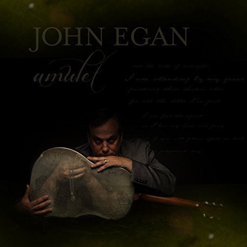 the album cover for John Egan - Amulet [Digipak]