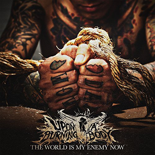 the album cover for Upon A Burning Body - World Is My Enemy Now