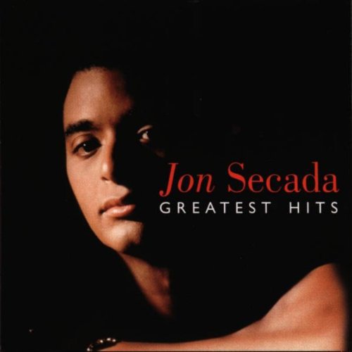 the album cover for Jon Secada - Greatest Hits