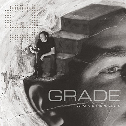 the album cover for Grade - Separate the Magnets