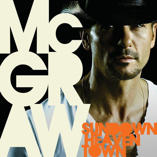 the album cover for Tim McGraw - Sundown Heaven Town