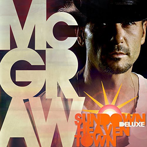 the album cover for Tim McGraw - Sundown Heaven Town [Deluxe Edition]