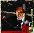 the album cover for Tom Ellard - Eighties Cheesecake