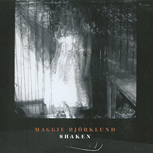 the album cover for Maggie Bjorklund - Shaken