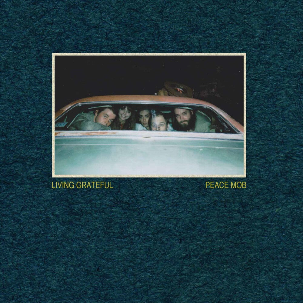 the album cover for Living Grateful - Peace Mob