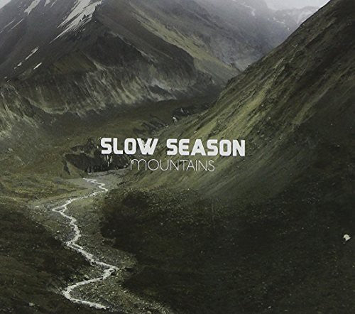 the album cover for Slow Season - Mountains