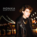 the album cover for Monika - Secret in the Dark