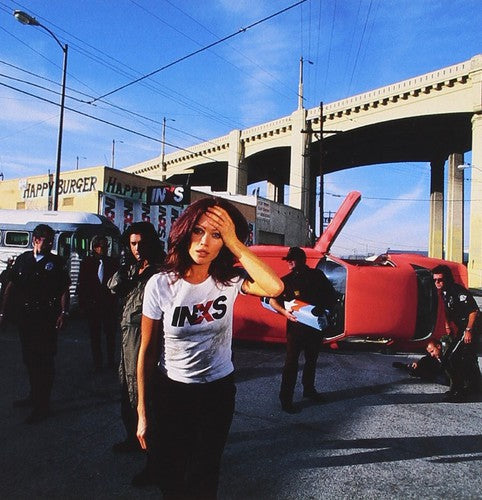 the album cover for INXS - Elegantly Wasted (Uk)