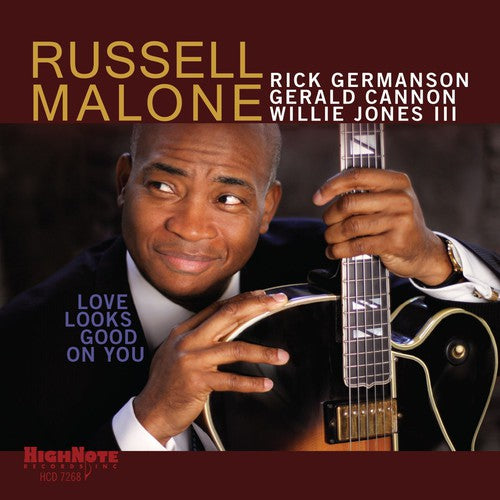 the album cover for Russell Malone - Love Looks Good on You