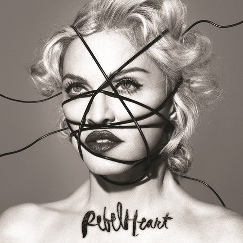 the album cover for Madonna - Rebel Heart [Deluxe]