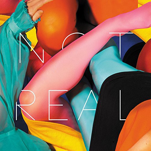 the album cover for Stealing Sheep - Not Real [Import]