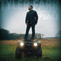 the album cover for Tyler Farr - Suffer in Peace
