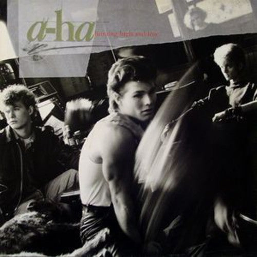 the album cover for A-Ha - Hunting High And Low [LP]