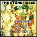 the album cover for The Stone Roses - Turns Into Stone [Remastered Deluxe Stone Colored Vinyl]