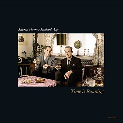 the album cover for Michael Mayer & Voigt,Reinhard - Time Is Running