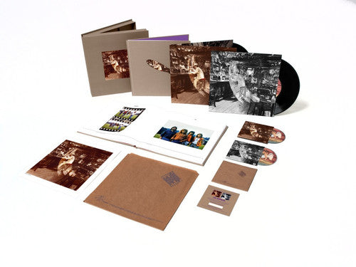 the album cover for Led Zeppelin - In Through The Out Door: Remastered Super Deluxe Edition [Box Set]
