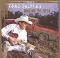 the album cover for Brad Paisley - Mud On The Tires