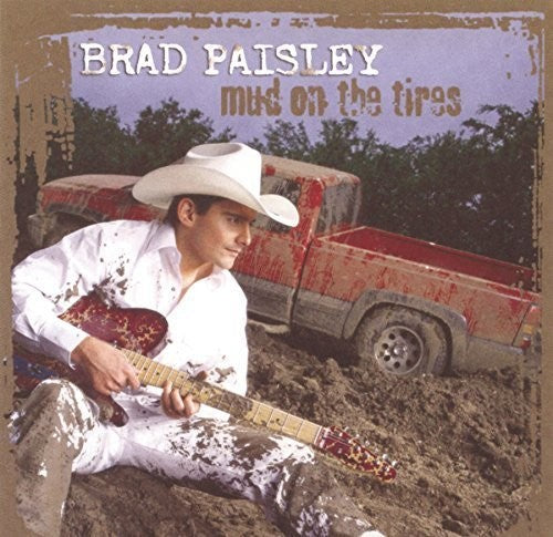 the album cover for Brad Paisley - Mud On The Tires