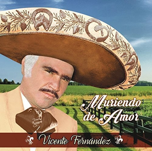 the album cover for Vicente Fernandez - Muriendo de Amor