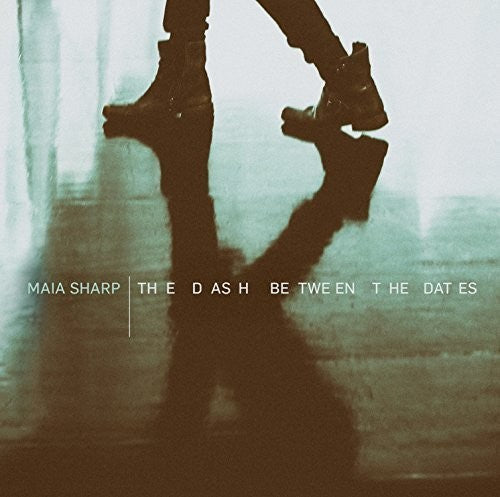 the album cover for Maia Sharp - The Dash Between The Dates
