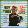 the album cover for Bobby Vinton - A Very Merry Christmas: The Complete Epic Christmas Collection
