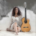 the album cover for Badi Assad - Hatched
